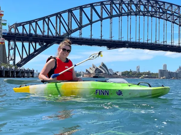 A corporate clean-up paddle on Sydney Harbour