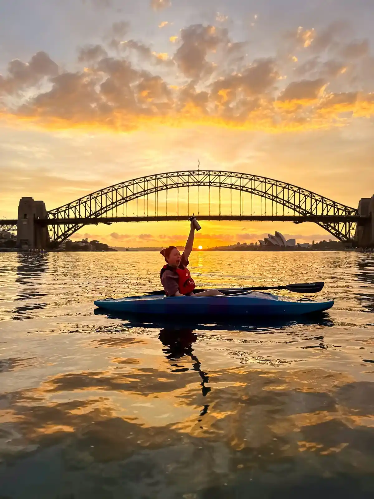 Kayakers enjoying the Sunrise Kayak and Coffee experience on Sydney Harbour